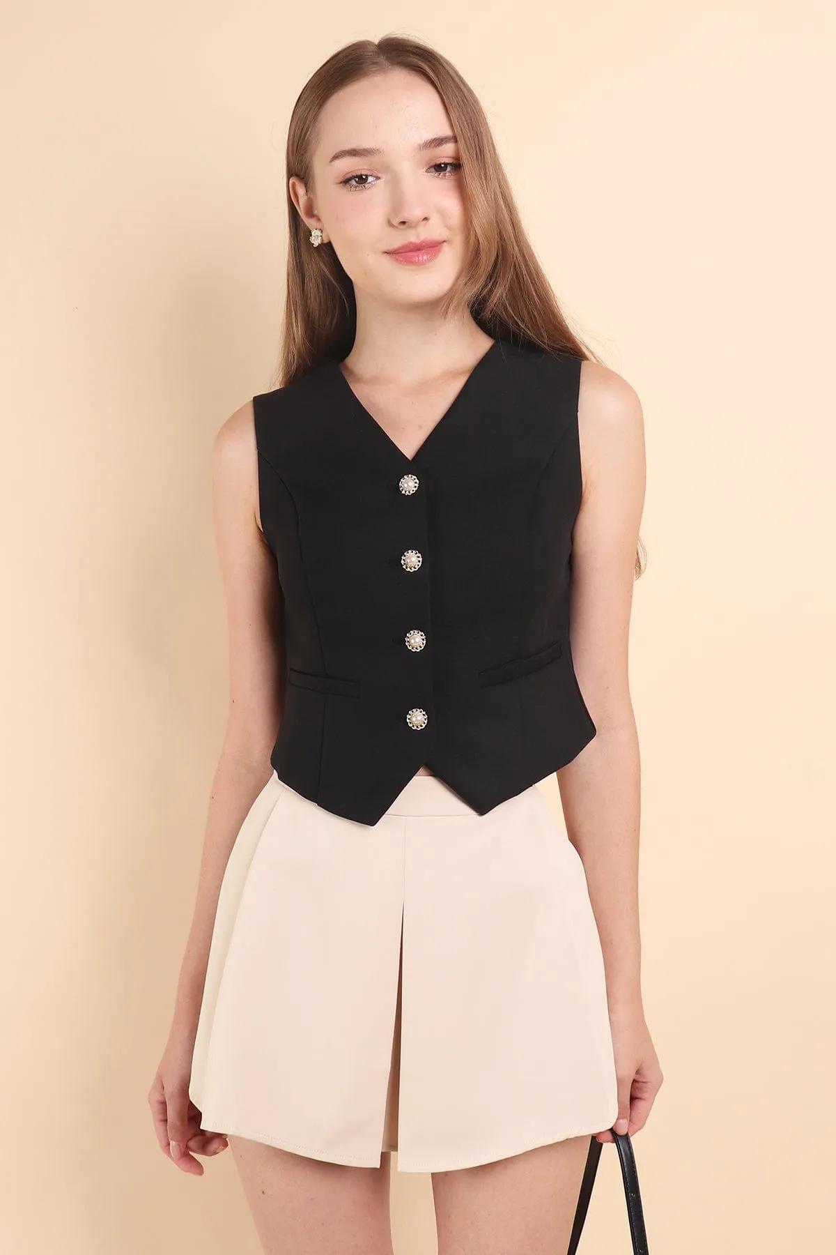 RESTOCKED** CAMU VEST TOP IN BLACK