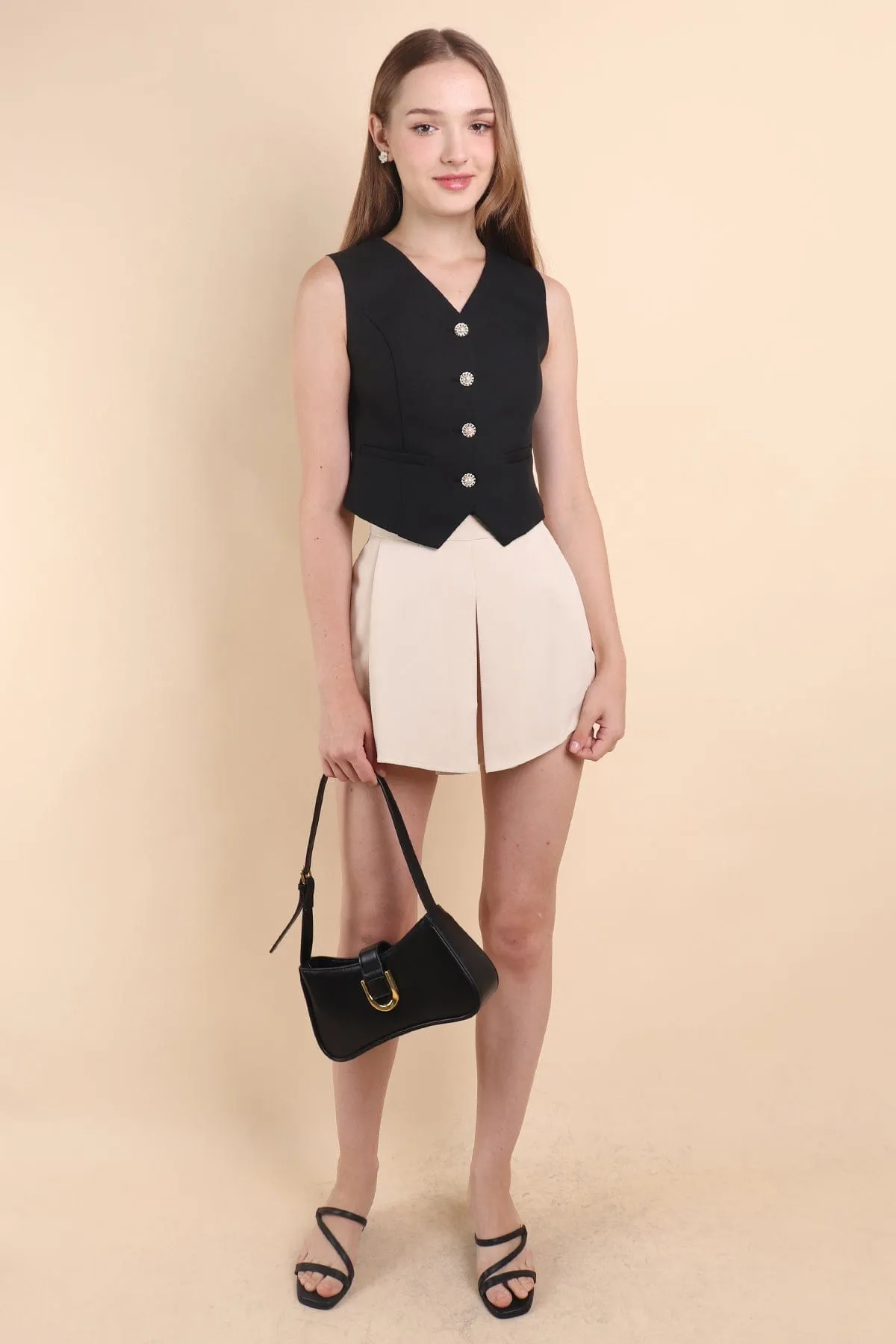 RESTOCKED** CAMU VEST TOP IN BLACK